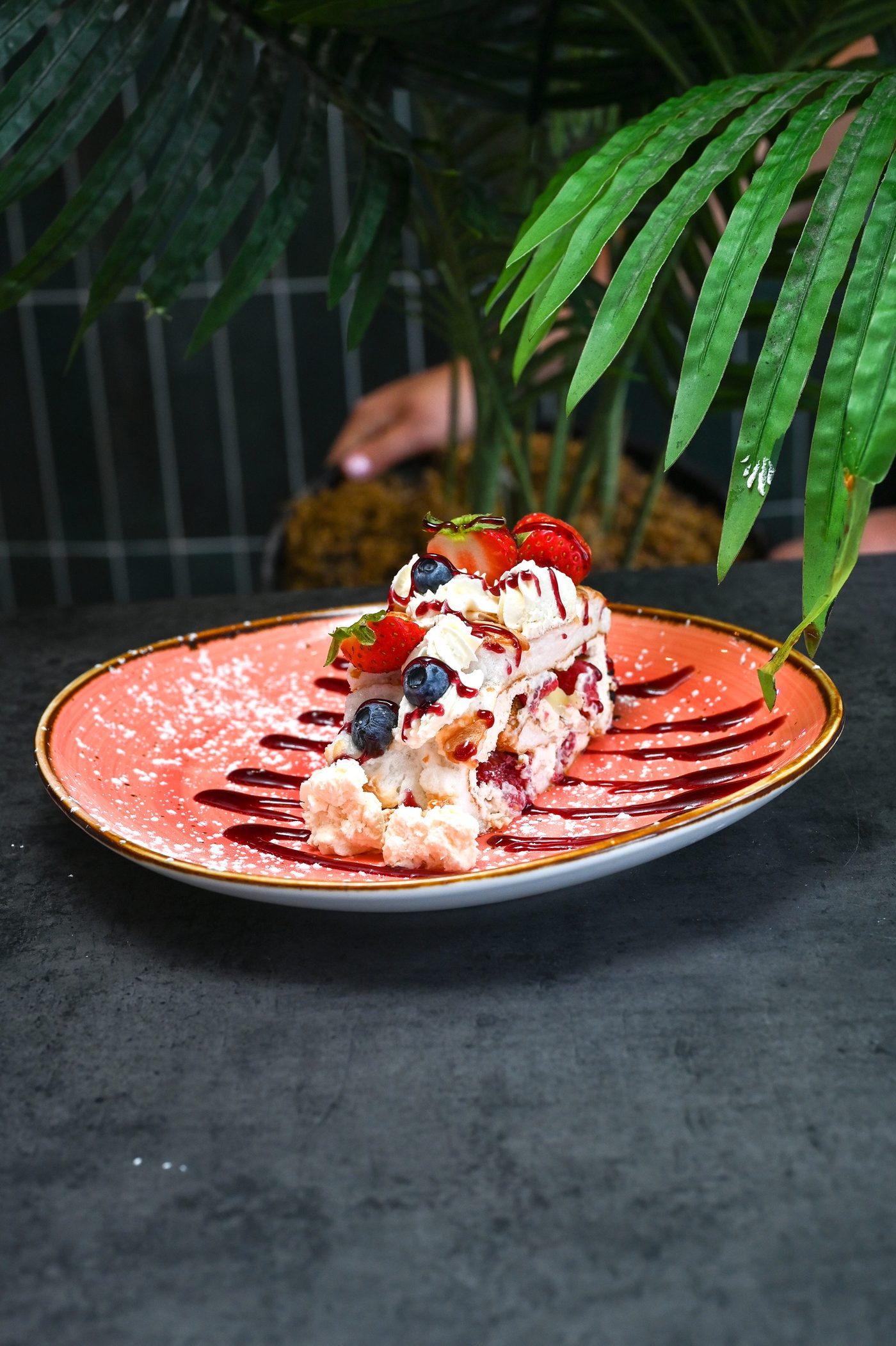 Belgian waffle with berries and cream