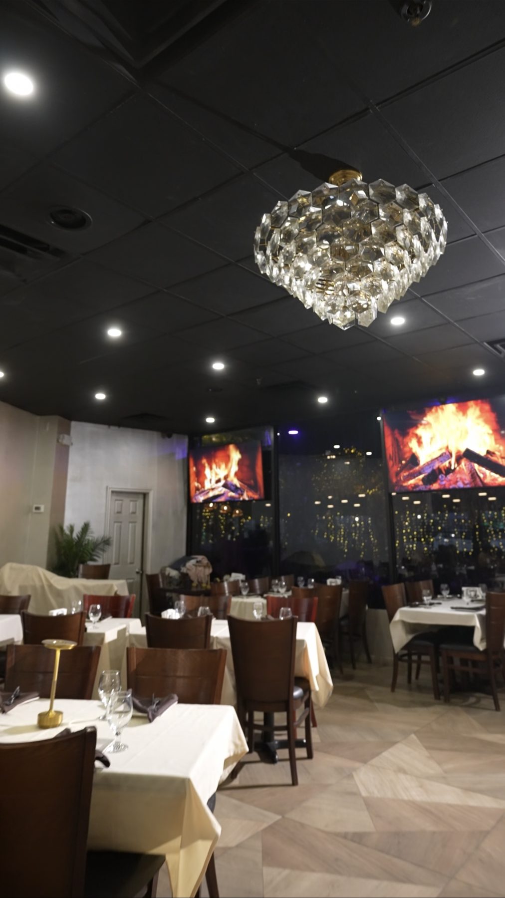 Chandelier dining room with fireplace