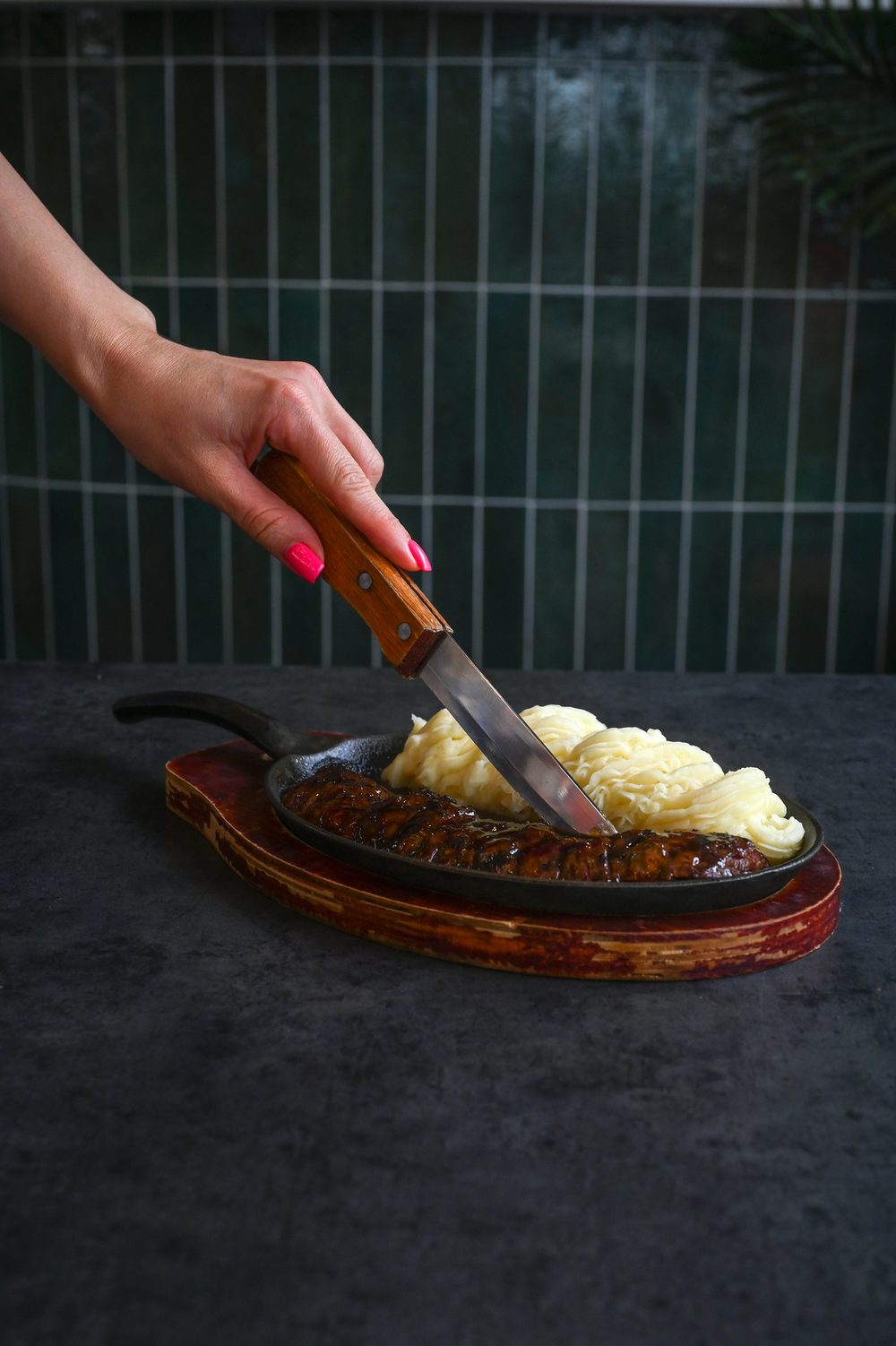 Carving potatoes in a cast-iron skillet